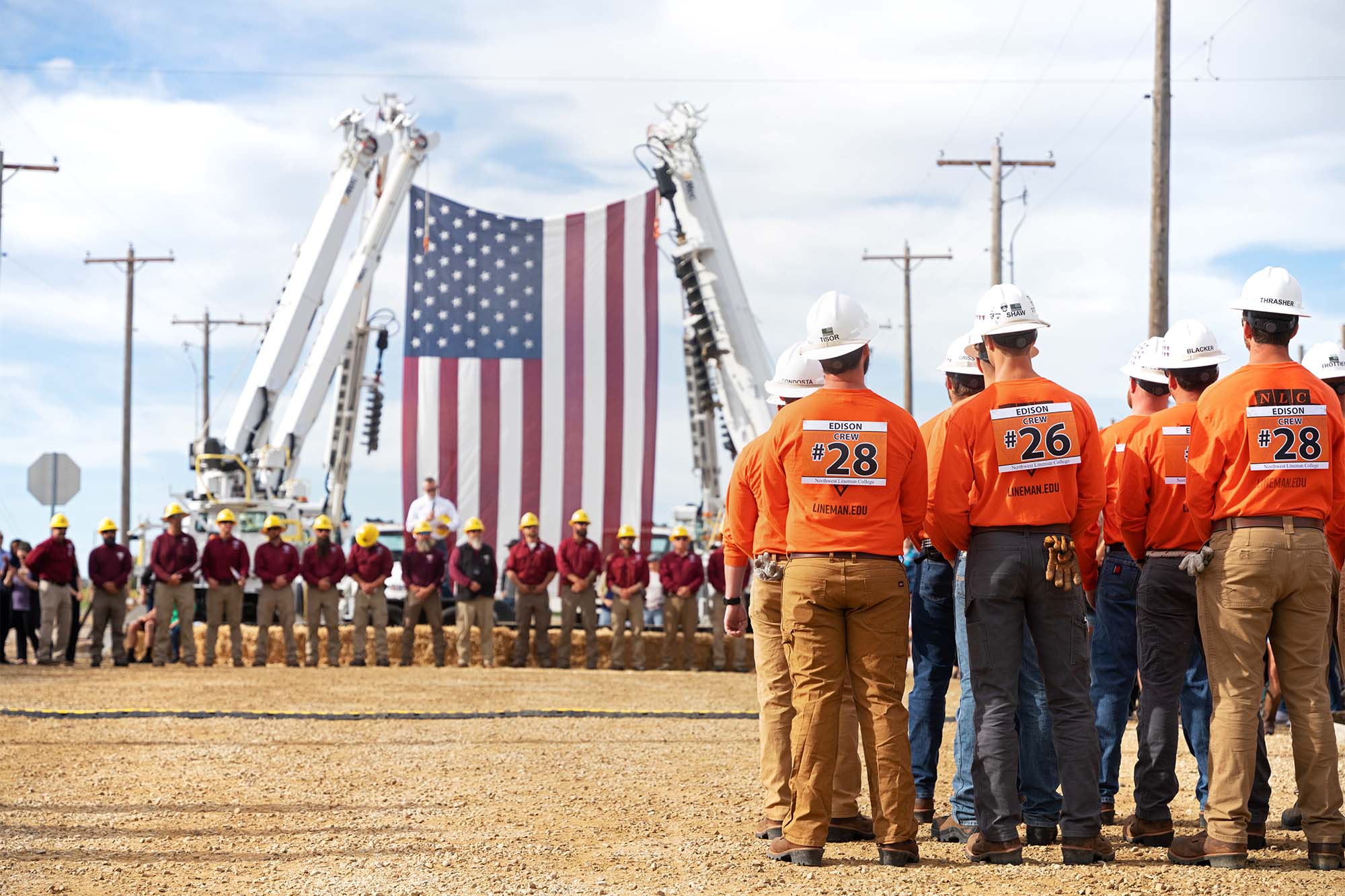 Students and instructors stand at attention during Idaho rodeo ceremony.