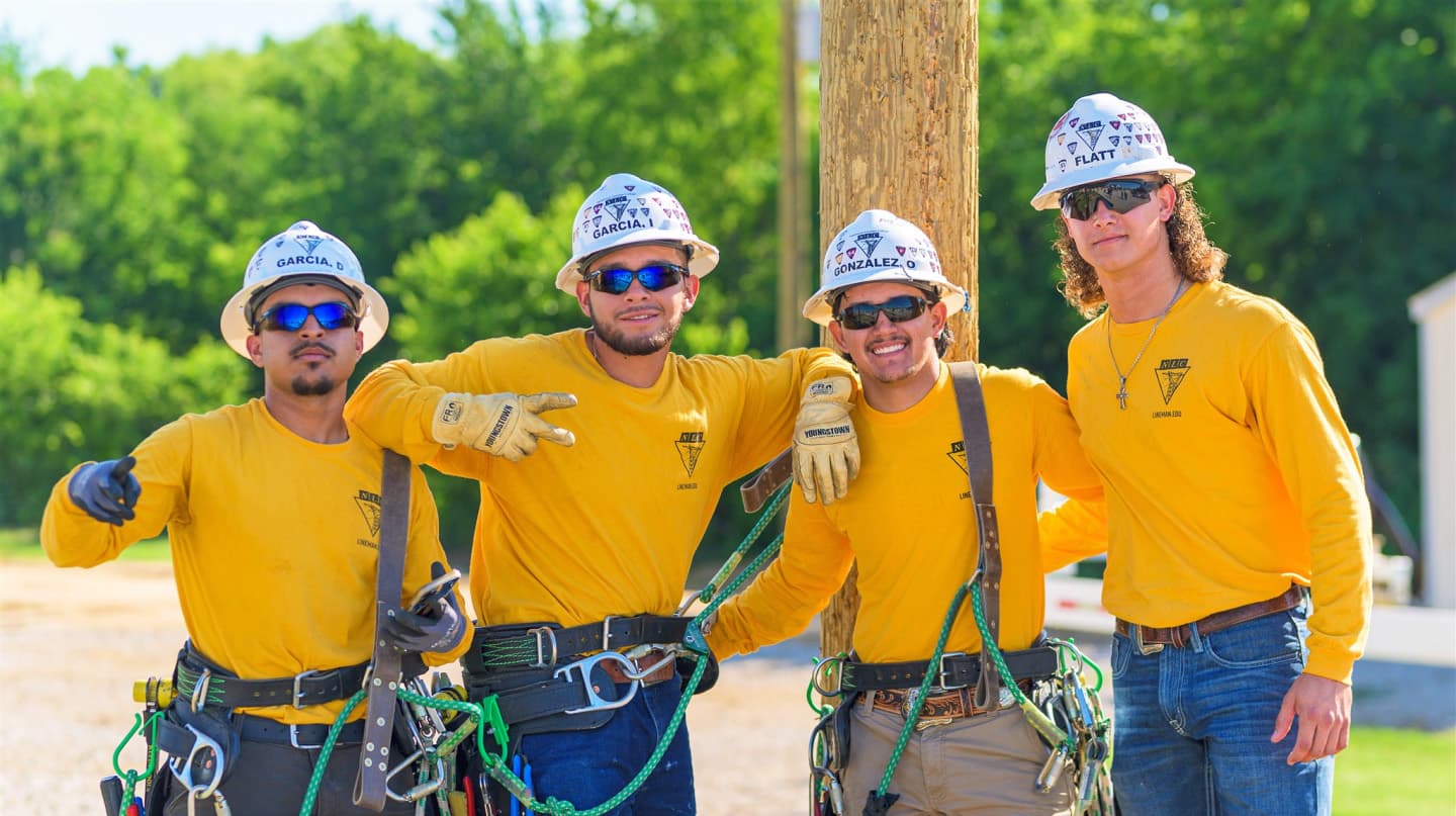 Group of Texas lineman students posing together.