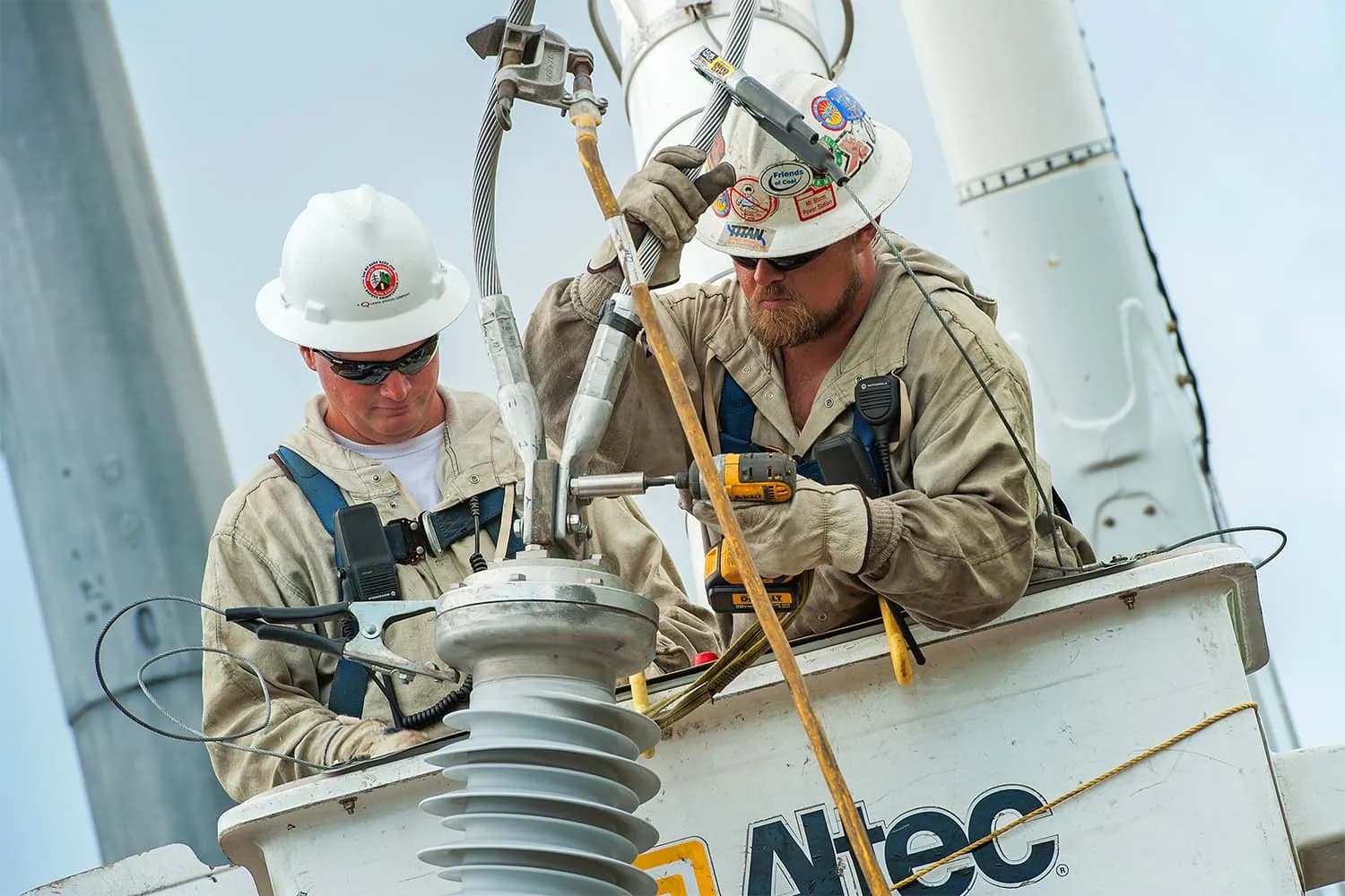 Lineman work transmission from bucket.