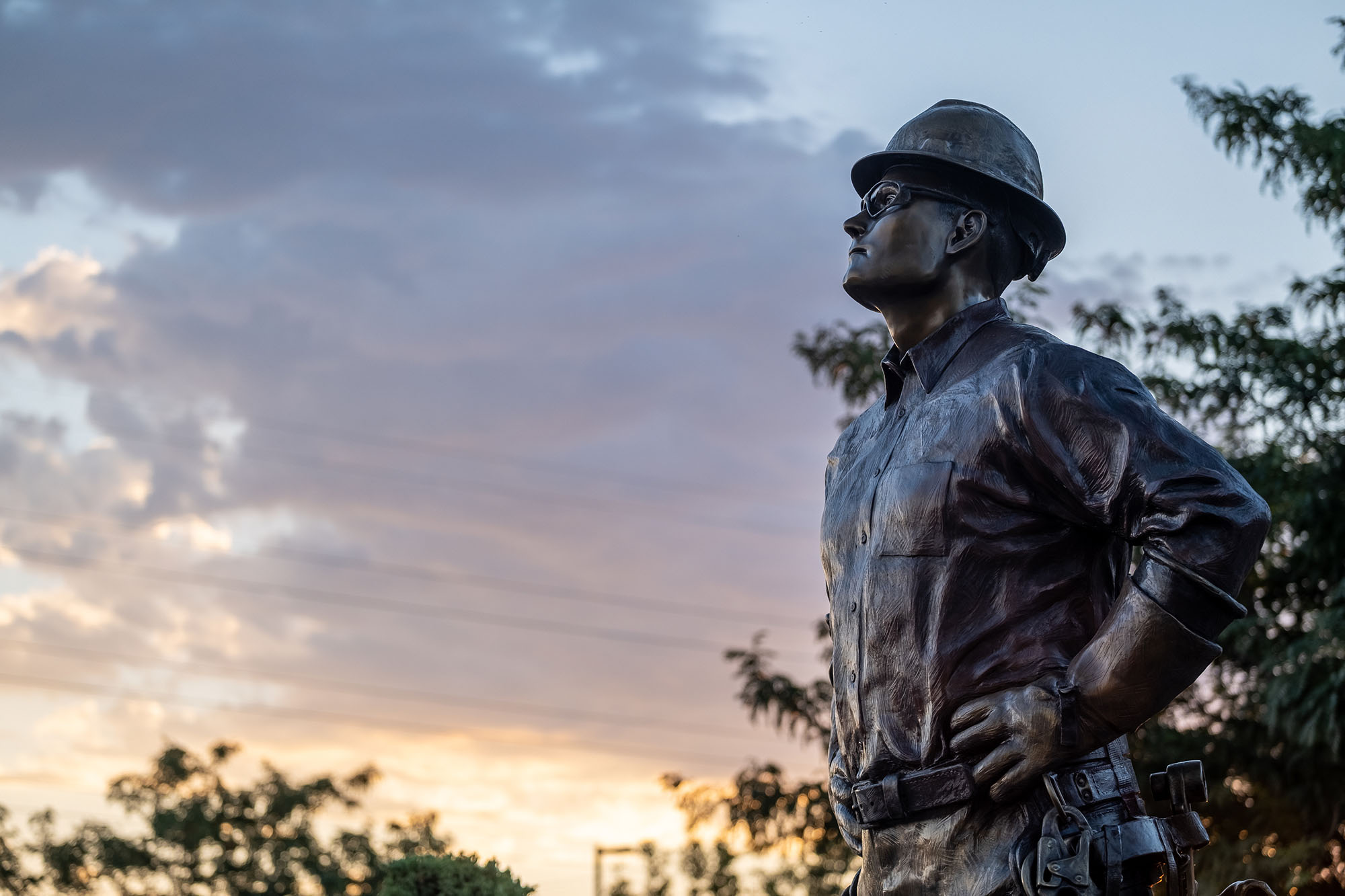 Bronze lineman at sunset in Meridian, Idaho.